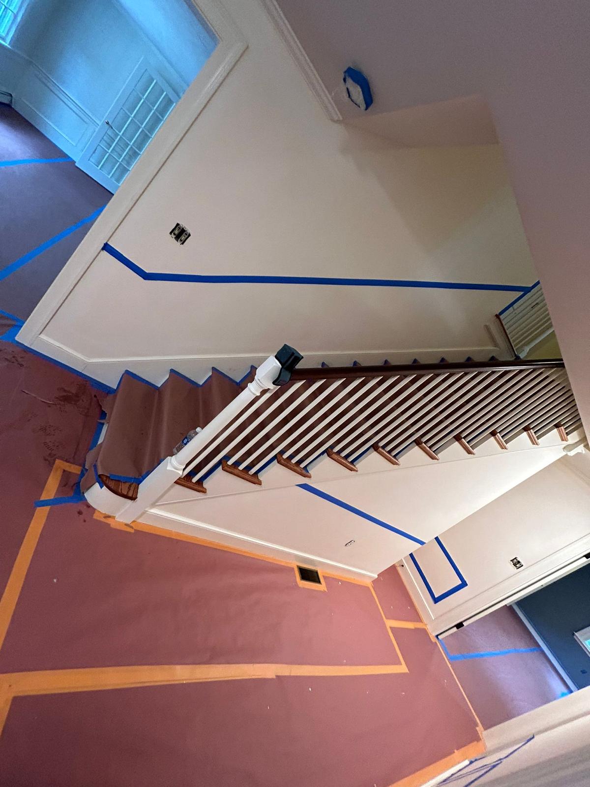 Precision masking & prep — staircase repaint in progress
